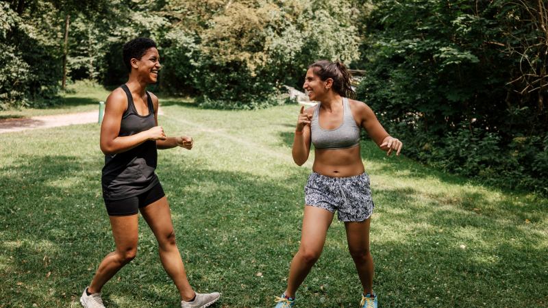Friends do sports in a park in Munich
